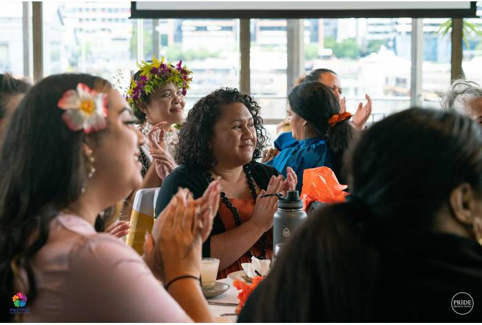 Guests applaud at a PBN gathering